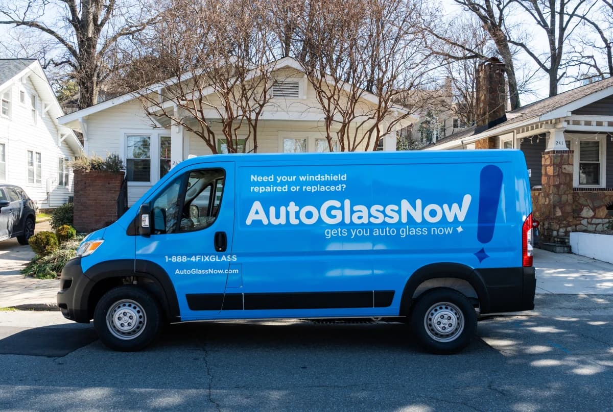 Mobile van in front of house